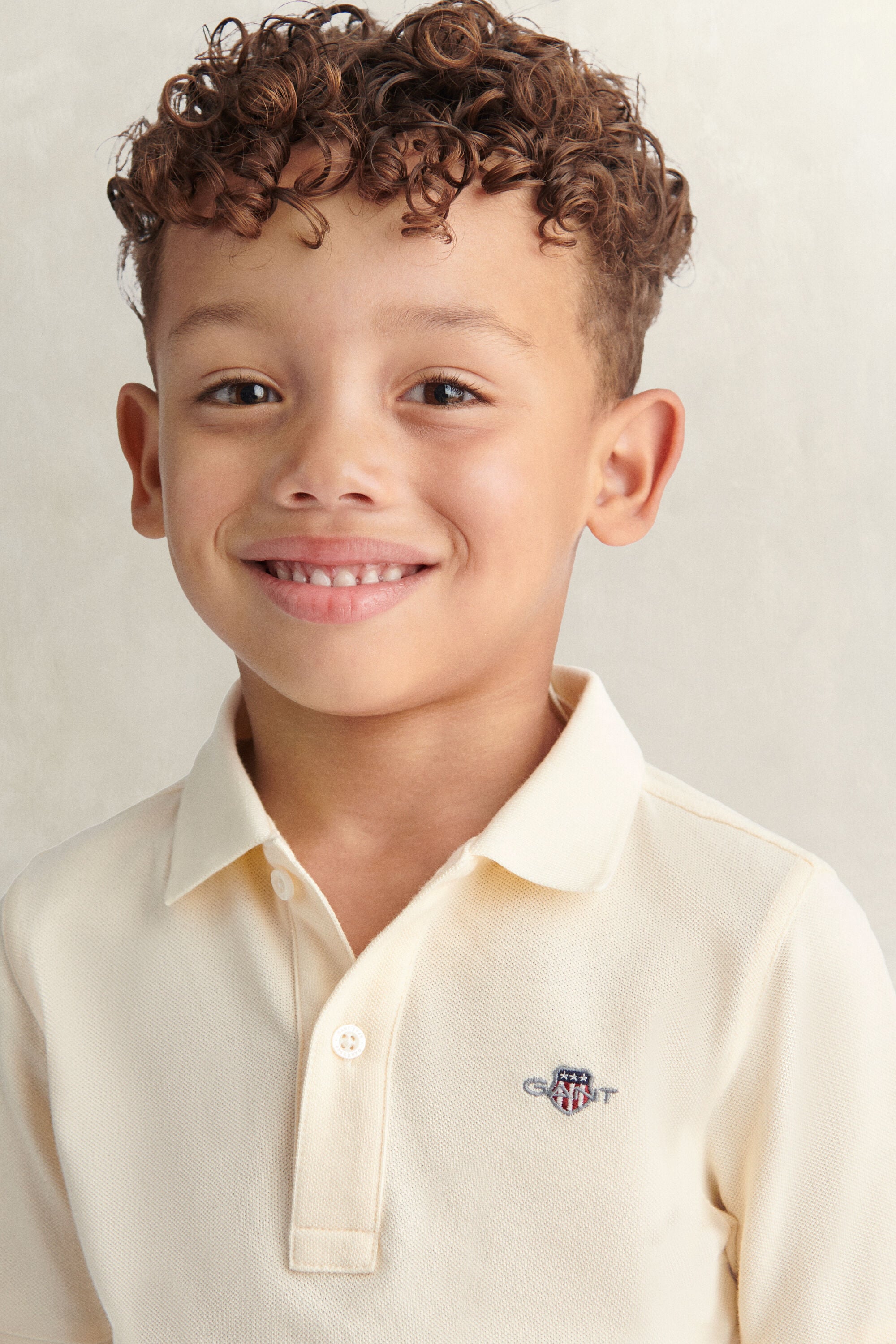 Kids Shield Polo Shirt — CREAMED WHITE