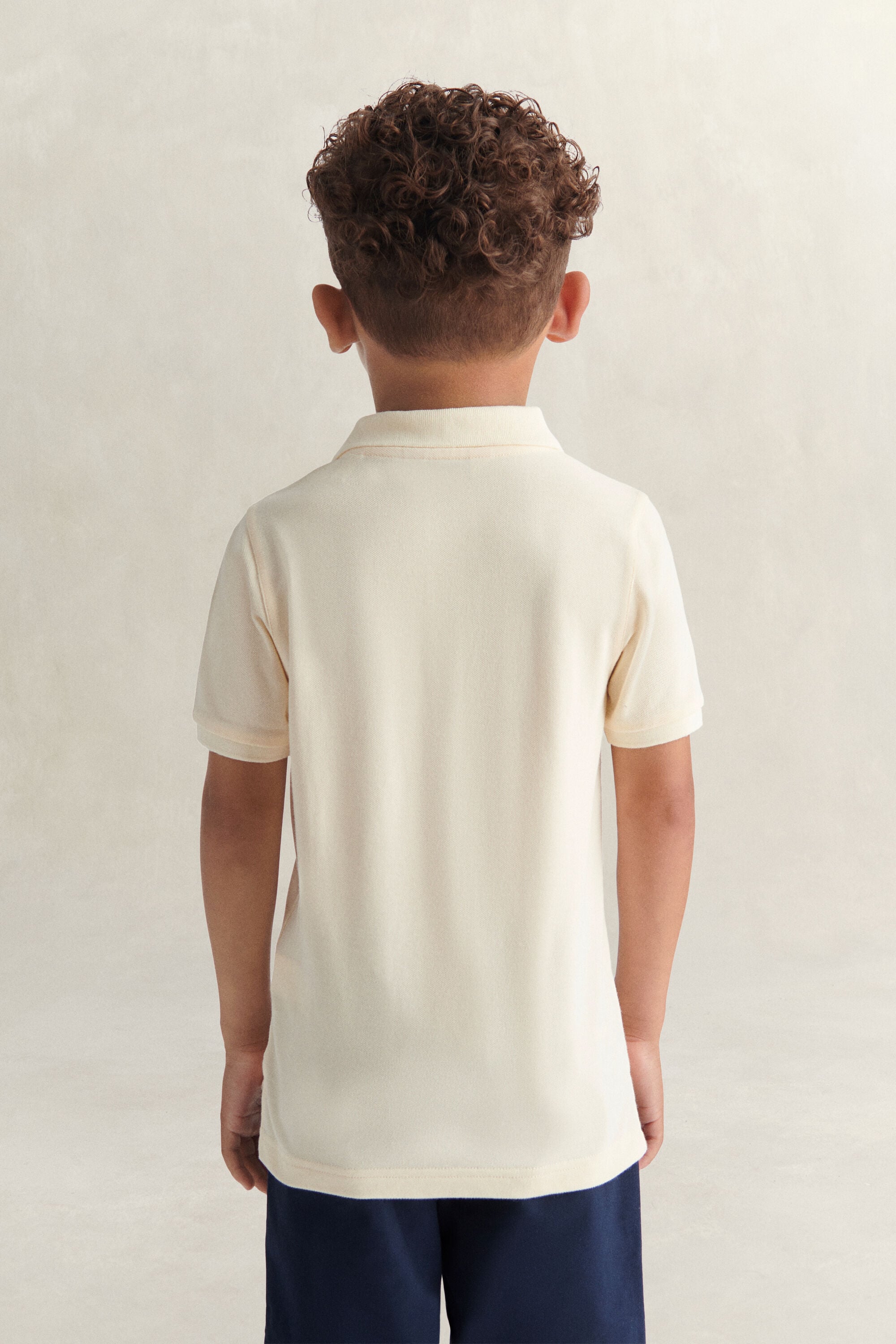 Kids Shield Polo Shirt — CREAMED WHITE