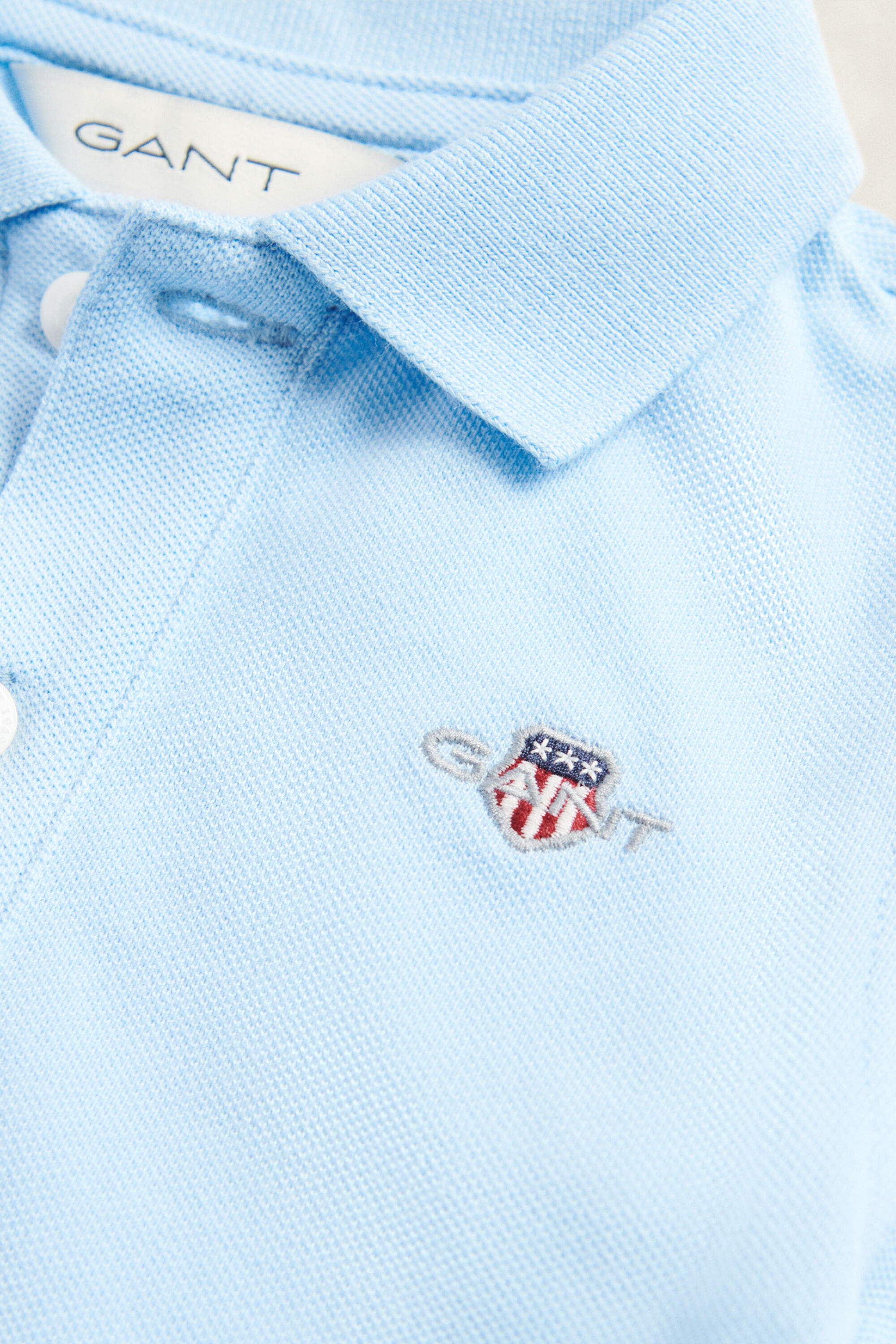 Kids Shield Piqué Polo Shirt