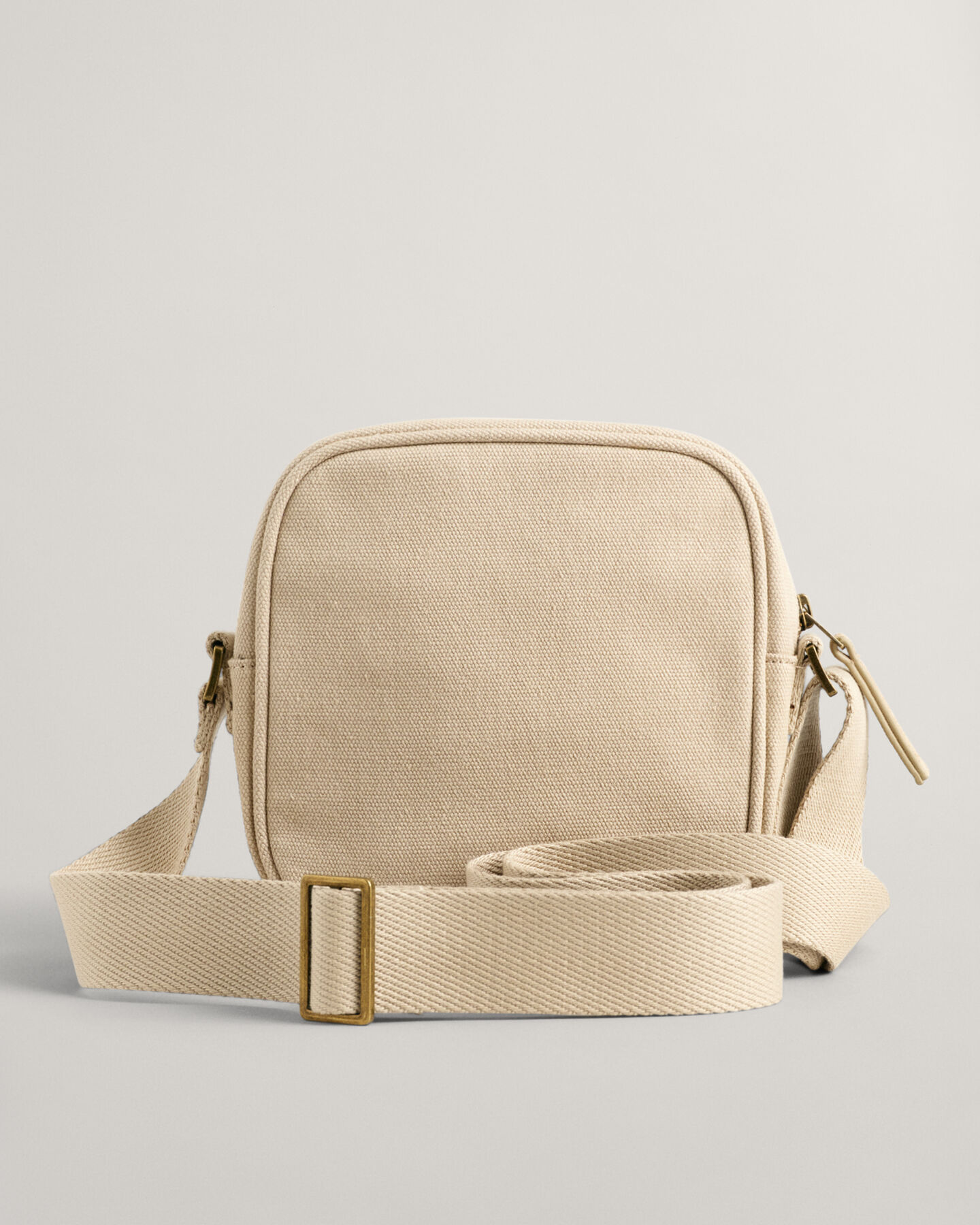 Tonal Shield Crossbody Bag