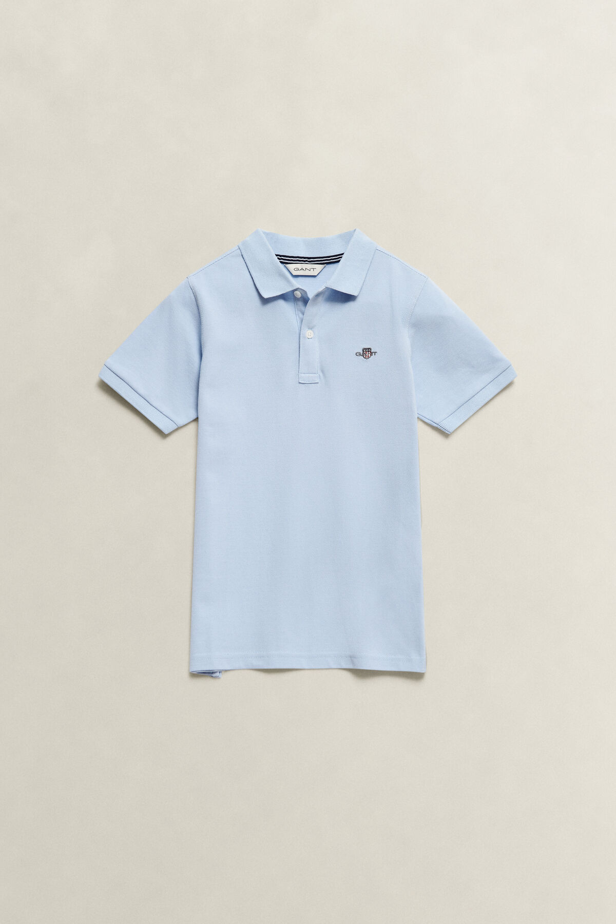 Teens Shield Polo Shirt — MUTED BLUE
