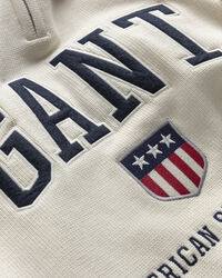 Retro Shield Half-Zip Sweater